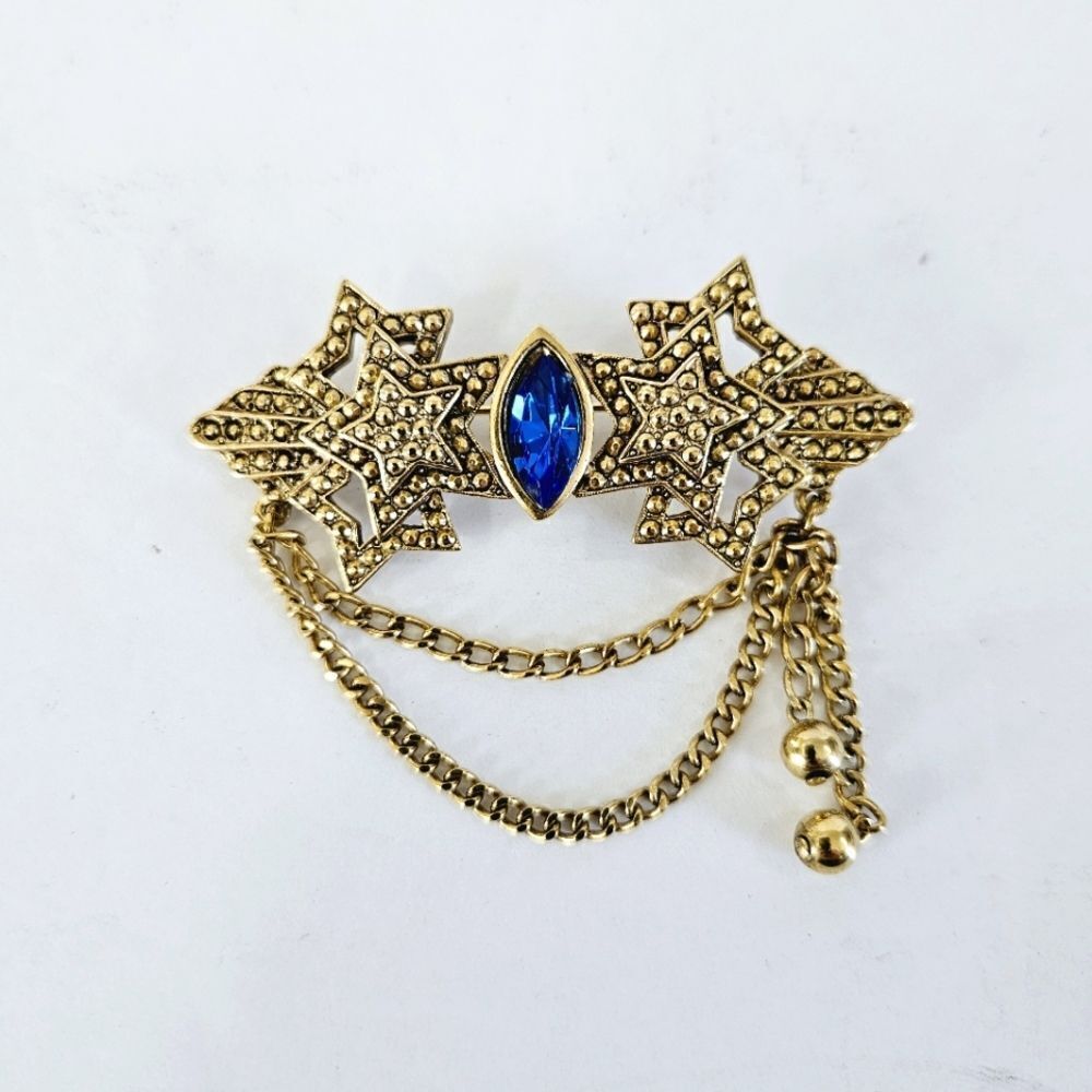 Vintage Signed AJC 1980's Blue Rhinestone Gold Tone Star Dangle Chain Brooch Pin